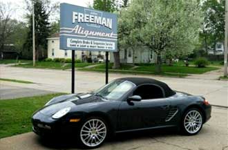 Black Car and Shop SIgn